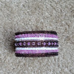 Woman's beaded purple & white bracelet